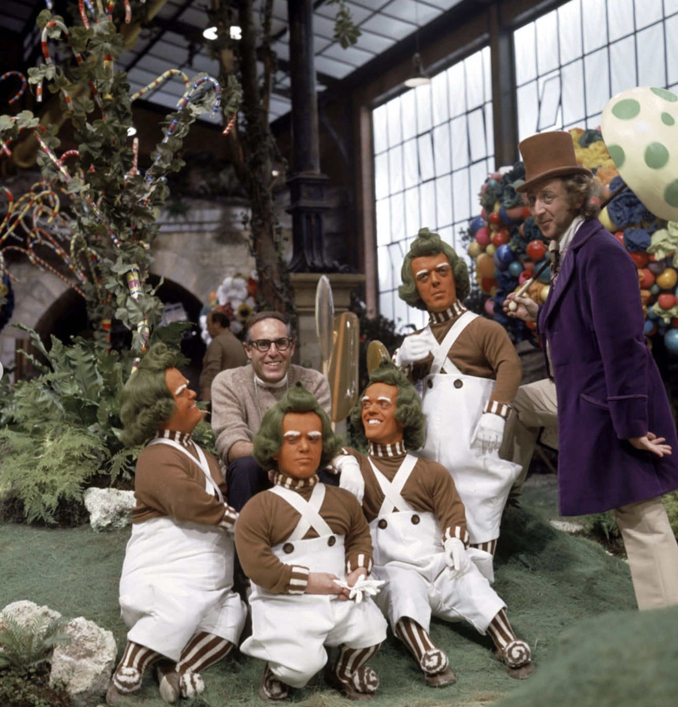 Gene Wilder posing with Oompa Loompa's 
